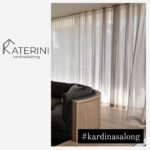 Katerini kardinasalongi logo ja heledad tüllkardinad kaasaegses elutoas Tallinnas